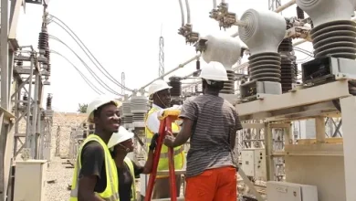 ECG engineers work on power infrastructure in Accra as part of a nationwide effort to upgrade transformers and improve electricity reliability.