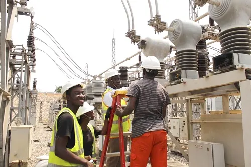 ECG engineers work on power infrastructure in Accra as part of a nationwide effort to upgrade transformers and improve electricity reliability.