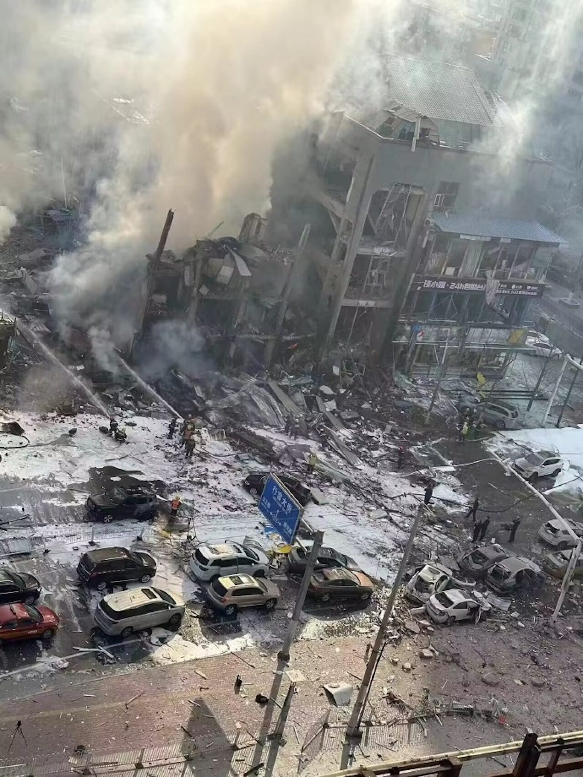 The blast ripped through a four-story building, state media said.