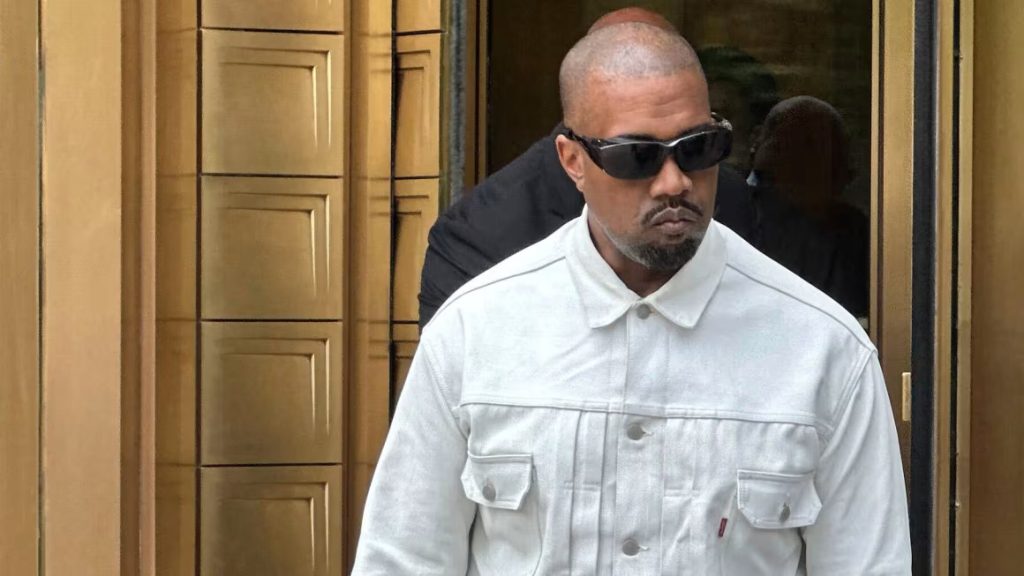 Ye, the rapper formerly known as Kanye West, leaves federal court during the trial of Sean "Diddy" Combs in New York on Friday, June 13, 2025. Michael R. Sisak/AP