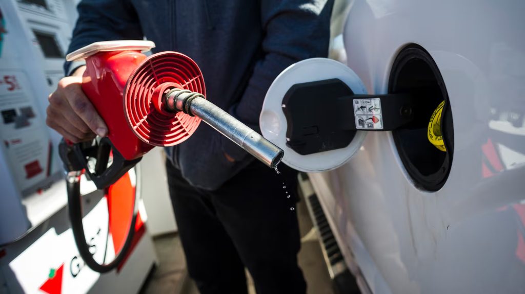 A man prepares to pump gas in Toronto, on April 1, 2019. THE CANADIAN PRESS/Christopher Katsarov (Christopher Katsarov/THE CANADIAN PRESS)