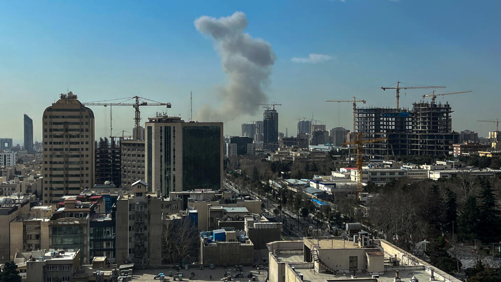 Smoke and explosions rise over Tehran following coordinated U.S. and Israeli airstrikes on February 28, 2026, in one of the most significant escalations in Middle East conflict this decade