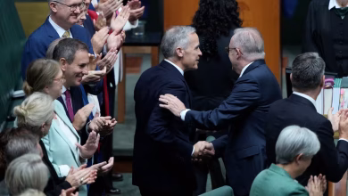 Text: Leaders of Canada and Australia meet during a diplomatic visit to discuss cooperation on critical minerals and global supply chains.