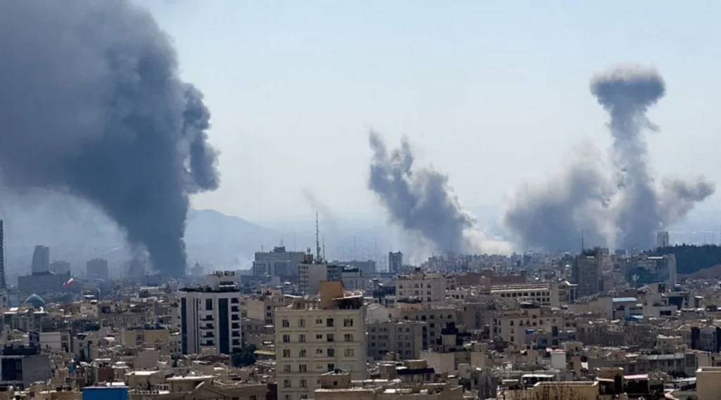 Smoke rises over a Middle Eastern city as global calls intensify for a ceasefire in the ongoing conflict.