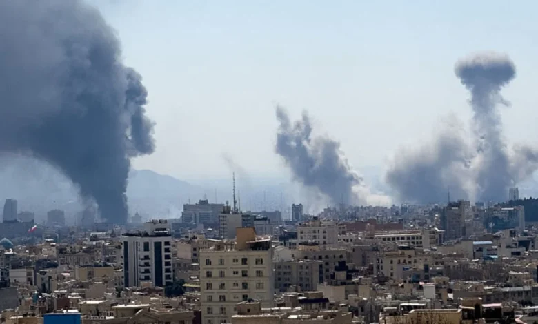 Smoke rises over a Middle Eastern city as global calls intensify for a ceasefire in the ongoing conflict.