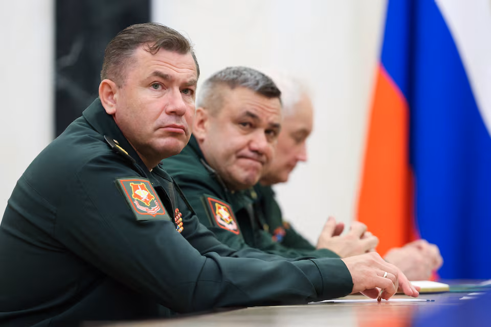 Denis Lyamin, newly appointed head of Russia's Unmanned Systems Forces, Valery Solodchuk, newly appointed head of the Logistics Service, and Defence Minister Andrei Belousov attend a meeting of Russian President Vladimir Putin with the leadership of the Defence Ministry, at the Kremlin in Moscow, Russia August 5, 2026
